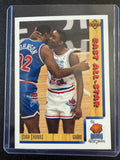 1991-92 Upper Deck #451 Isiah Thomas All-Star del Este – Magic Johnson en la foto