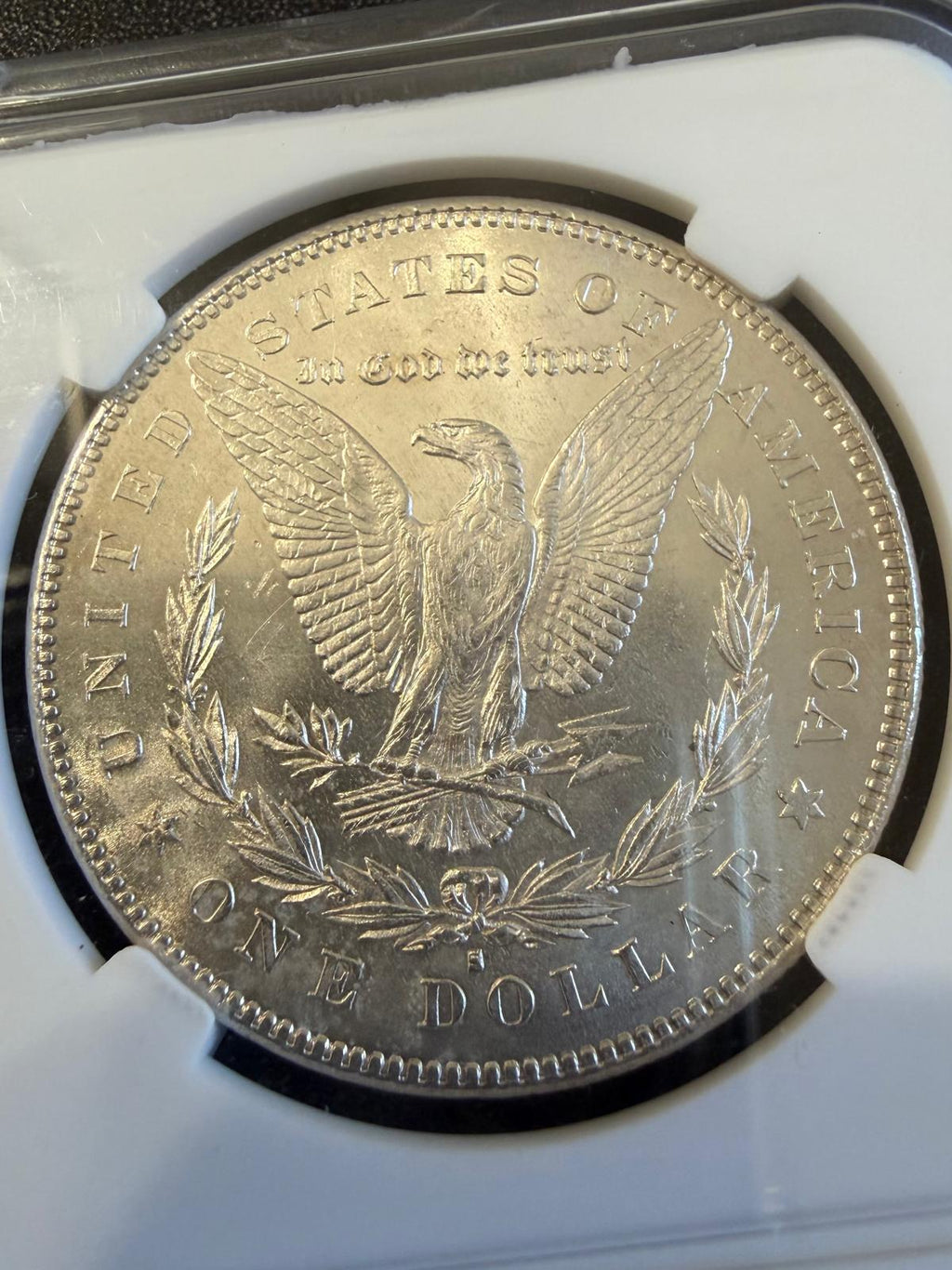 Dólar Morgan de 1878-S, reverso estándar de 7 plumas de cola de 1878, aproximadamente MS62–MS63.